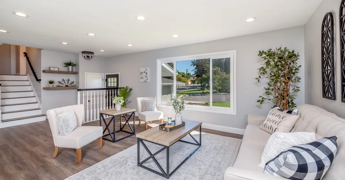 Clean, bright living room with large windows
